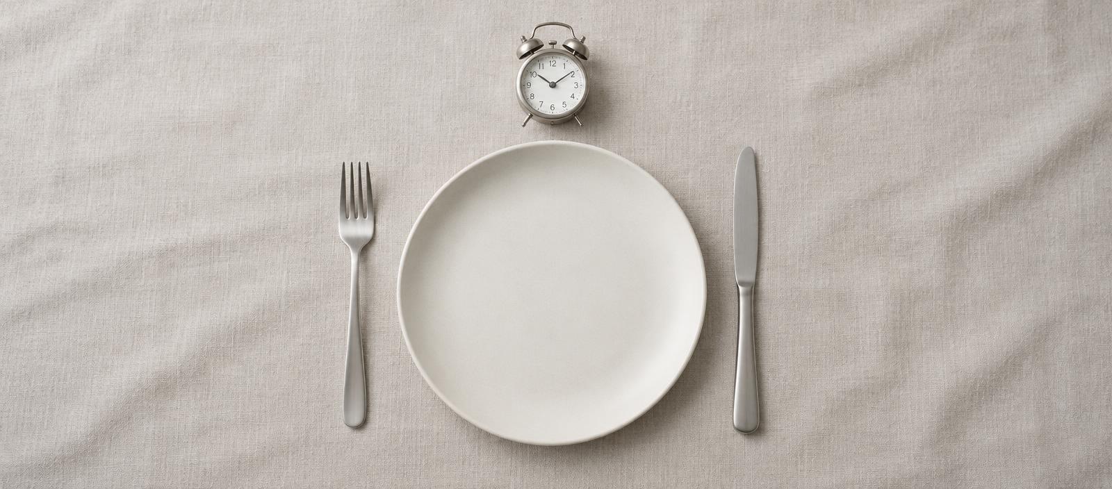 Empty plate and clock